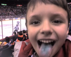 My son SM showing off his blue tonuge after enjoying some cotton candy at a Cyclones game last season.