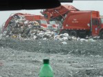Easter and Rumpke tour 036 Trucks dumping trash.